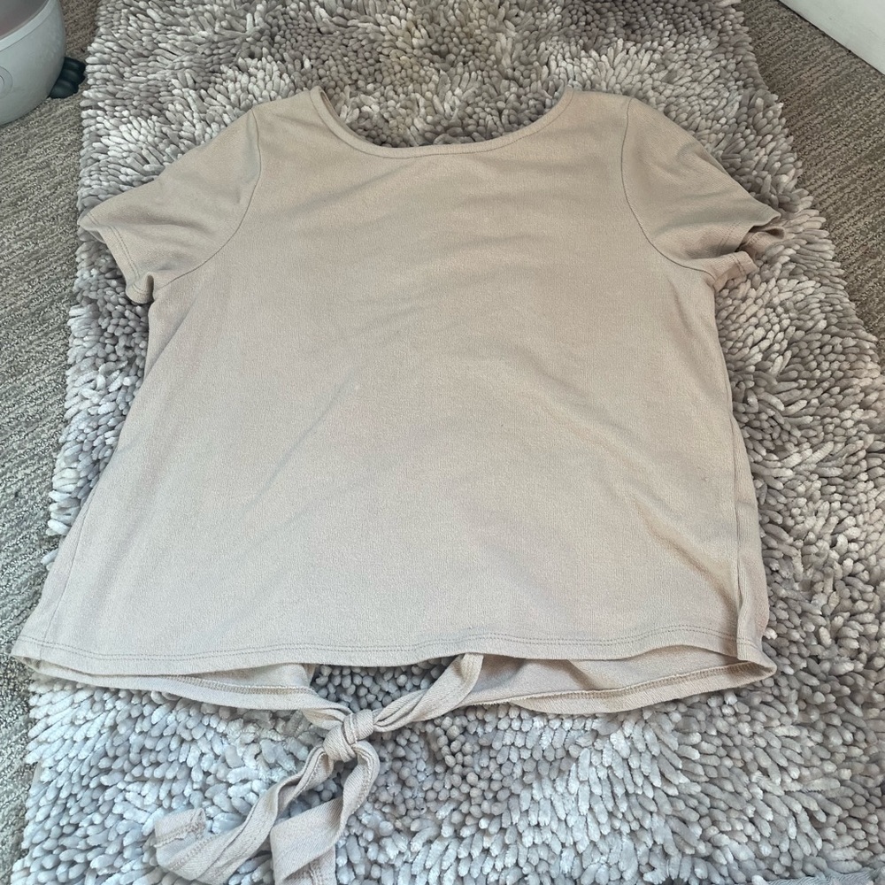 It’s tan and opens up in the back